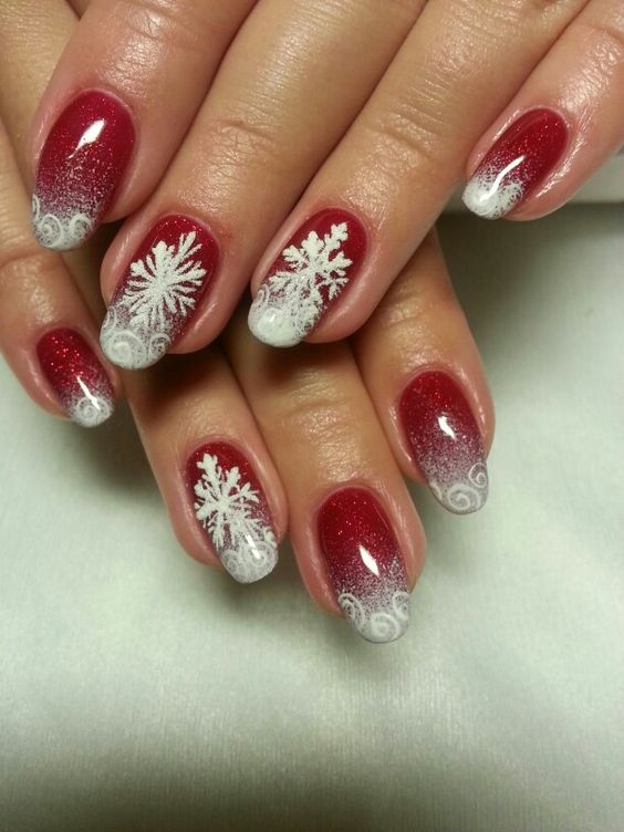 Winter nails with snowflake; red and white Christmas nails; cute and unique Christmas nails; holiday nails; Xmas nail designs; holidays manicure.