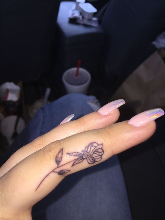 Tiny finger tattoos for girls; small tattoos for women; rose finger tattoos; ring finger tattoos; finger tattoos with meaning; small word tattoos; cute finger tattoos.