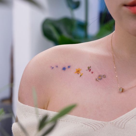  flower tattoos; rose tattoos; beautiful tattoos; wrist tattoos; rose tattoos on shoulder.